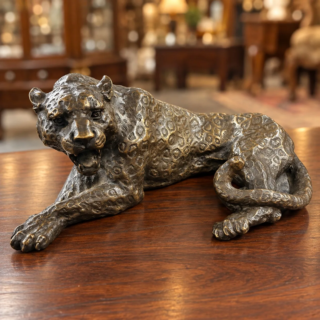 Metallic leopard sculpture